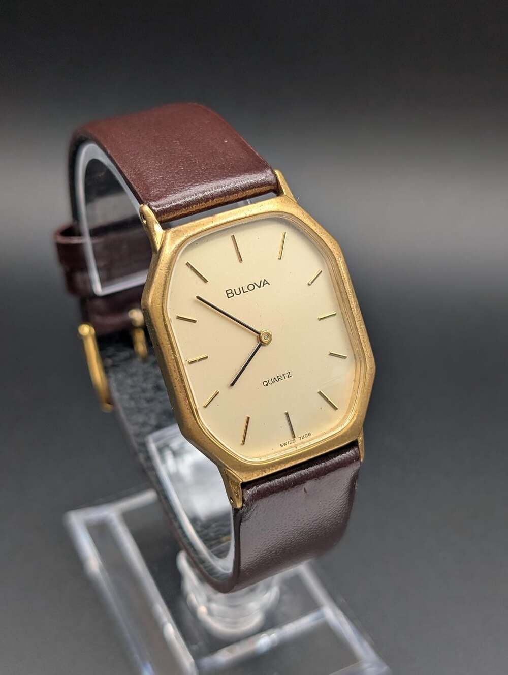 Vintage Bulova Gold-Tone Quartz Tank Watch, Gold Dial Leather Strap
